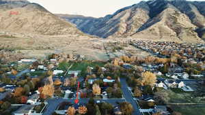 View of mountain background featuring nearby suburban area