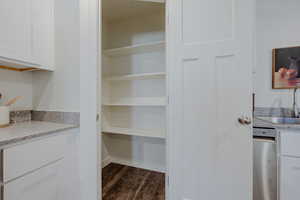 Pantry featuring a sink