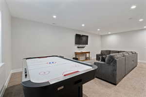 Rec room featuring carpet and recessed lighting