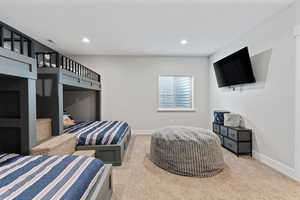 Carpeted bedroom featuring recessed lighting