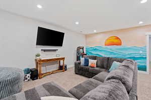 Living room featuring carpet and recessed lighting