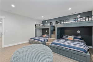 Bedroom with carpet floors and recessed lighting