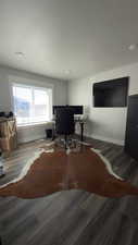 Home office featuring wood finished floors