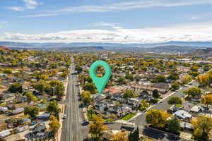 Aerial view of residential area with a mountainous background