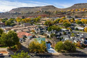 View of property location featuring nearby suburban area and a mountainous background