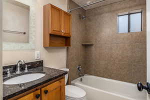 Full bathroom with vanity and bathtub / shower combination