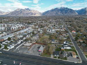 Aerial overview of property's location featuring a mountainous background