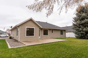 Back of property featuring a patio area