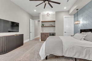 Bedroom with wine cooler, a ceiling fan, and recessed lighting