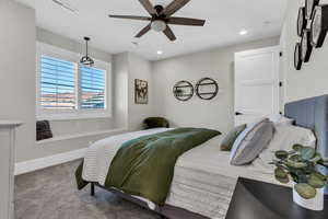 Bedroom featuring carpet floors, a ceiling fan, and recessed lighting