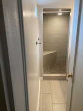 Full bath with a shower stall