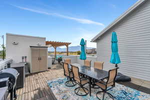 Spacious terrace for additional outdoor seating, and dining, space for a grill included with built in cabinets for storage