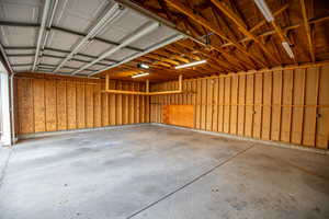 Garage featuring a garage door opener