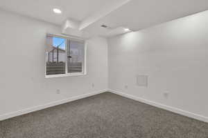 Bedroom featuring carpet flooring and recessed lighting