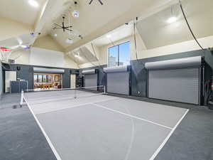 View of tennis court with ceiling fan