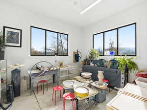 PoDining room with concrete flooring and healthy amount of natural light