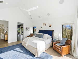 Bedroom featuring high vaulted ceiling, hardwood / wood-style floors, ceiling fan, and recessed lighting