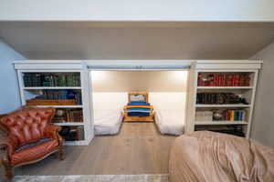 Bedroom with wood finished floors