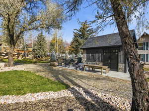 View of yard featuring a patio area and a sunroom