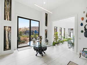 Dining space featuring recessed lighting