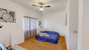 Bedroom featuring carpet flooring and a ceiling fan