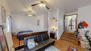 Bedroom with carpet and ceiling fan