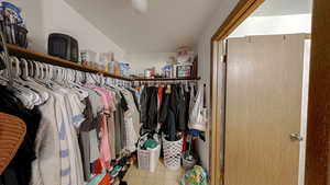 Spacious closet with light flooring