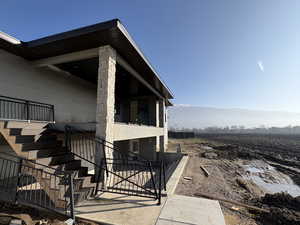 Property entrance featuring a patio area