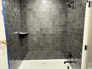 Bathroom featuring bathing tub / shower combination