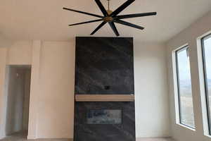 Detailed view of a premium fireplace and ceiling fan