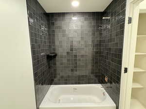 Bathroom featuring bathing tub / shower combination