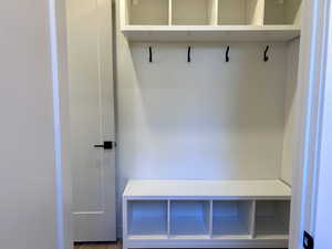 Mudroom featuring wood finished floors
