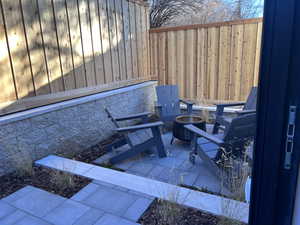 View of patio / terrace with an outdoor fire pit