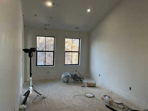 Unfurnished room featuring baseboards