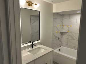 Bathroom with vanity and shower / bath combination