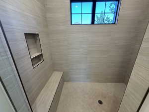 Bathroom with tiled shower