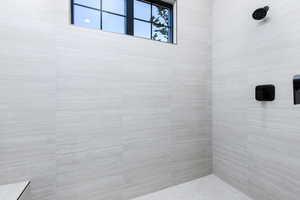 Bathroom with a tile shower