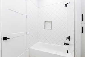 Bathroom with bathing tub / shower combination