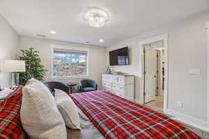 Master Bedroom featuring baseboards and recessed lighting