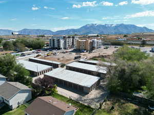 Bird's eye view of a mountainous background and industrial structures