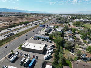 Bird's eye view of a major roadway and a mountainous background
