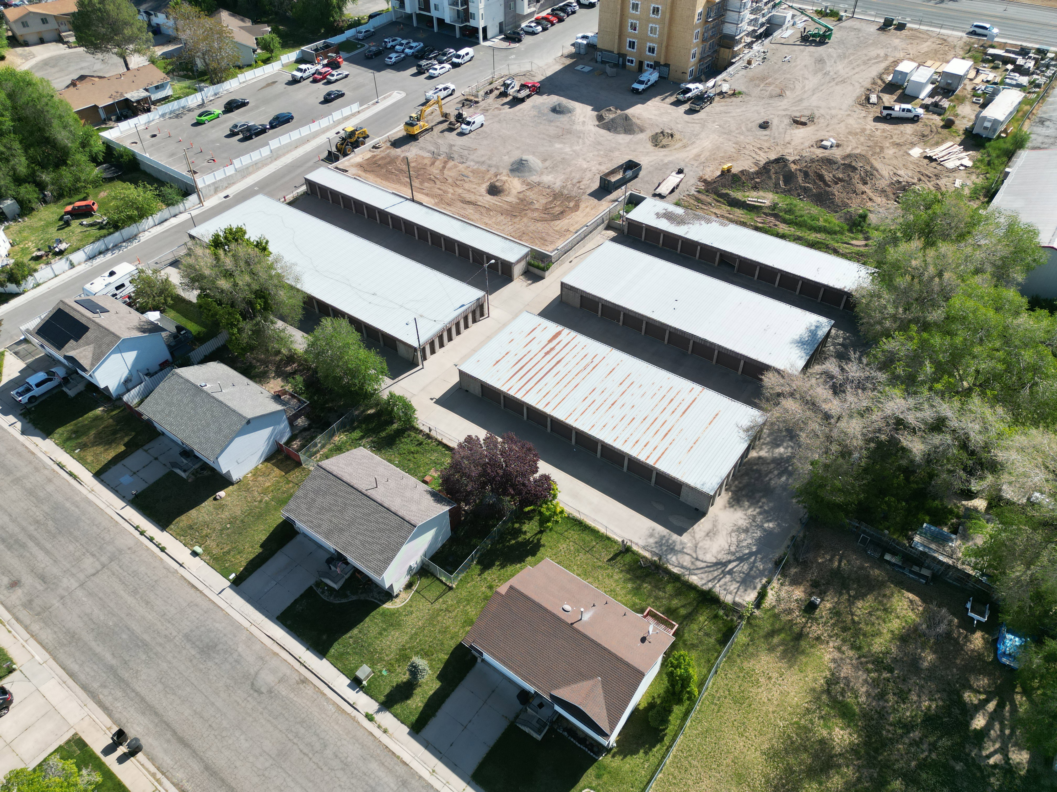 Aerial view of property's location featuring nearby suburban area