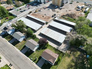 Aerial view of property's location featuring nearby suburban area