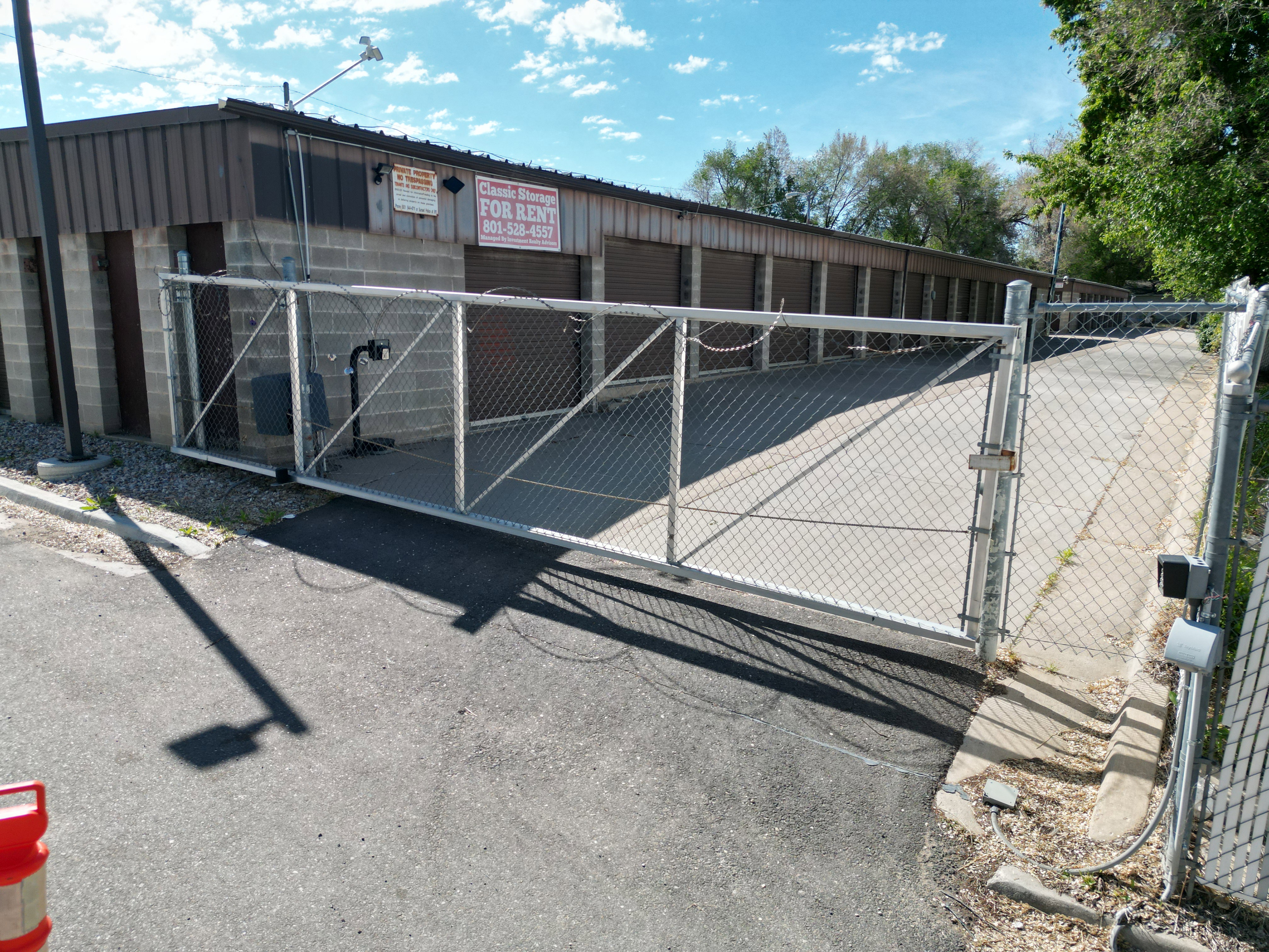 Gate with an outbuilding