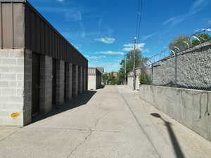 View of concrete alley