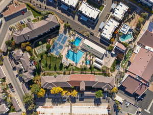 Aerial overview of property's location with a pool area