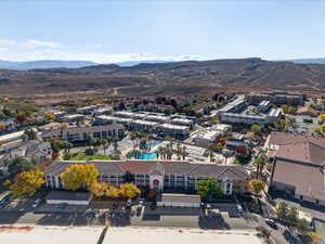 Aerial view of a pool area and mountains