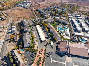 Aerial view of property and surrounding area with a pool area