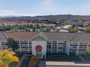 Bird's eye view of mountains and apartment complex