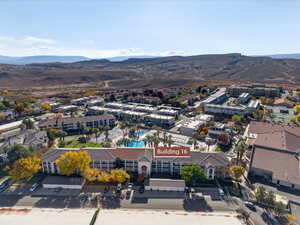 Drone / aerial view of a pool and mountains